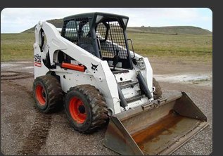 Bobcat mini yükleyici, kova yerde, arazi çalışması